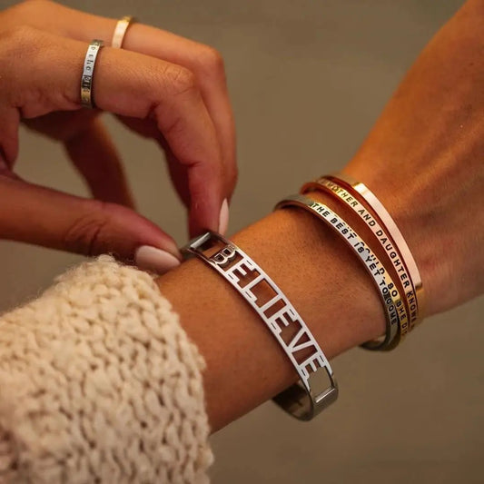 Woman wearing Inspirational Bracelet For Women With "Believe" Saying On It